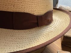 Genuine toquilla straw Chocolate brown hatband and binding Brim: 2-3/8" Crown: 4" Ready to ship Store credit or exchange only Adjustable Brown Toquilla Straw Hat Band, Brown Toquilla Straw Hat For Ranch, Brown Toquilla Straw Hat For The Ranch, Brown Straw Hat Band For Ranch, Fitted Vintage Brown Panama Hat, Brown Toquilla Straw Hat Bands For Ranch, Vintage Fitted Brown Panama Hat, Fitted Brown Toquilla Straw Hat, Classic Brown Straw Hat For Western-themed Events