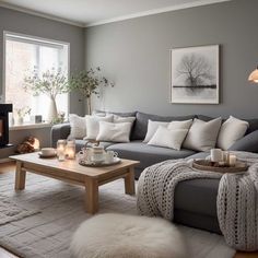 a living room filled with furniture and a fire place