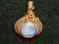 You will receive 1 pcs  of Natural White rainbow moon stone Pumpkin Pendent Copper Wire Wrapped pendant Halloween Healing Necklace Filigree Art Wire Wrap jewelry .Stone : White moon stone Pendant Size:   29 to 34  mm long include bail  .Many thanks for you visit my store ♥ if you have any question please contact us.For wholesale Price Please Convo me.You can order different items as many you like . Fantasy Moonstone Jewelry Gift, Fantasy Moon Shaped Jewelry Gift, Stone Pumpkin, Fire Jewelry, Bijoux Fil Aluminium, Wire Wrap Jewelry, Art Wire, White Moon, Healing Necklace