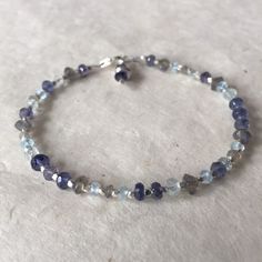 A personal favorite from my Etsy shop https://www.etsy.com/listing/268816143/labradorite-iolite-aquamarine-sky-blue Blue Aquamarine Beaded Bracelet With Natural Stones, Blue Beaded Bracelets With Birthstone, Blue Birthstone Round Bead Bracelets, Blue Birthstone Bracelets With Round Beads, Blue Birthstone Beaded Bracelets, Blue Spiritual Bracelets With Birthstone, Spiritual Blue Birthstone Bracelets, Blue Faceted Bead Gemstones For Gifts, Blue Faceted Beads Gemstones For Gifts