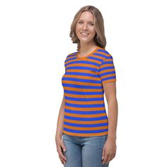 Introducing our Blue Orange Striped T-Shirt for Women, a must-have addition to your wardrobe! This stylish t-shirt is not only visually appealing with its vibrant blue and orange stripes, but it also offers exceptional comfort and durability. See more striped clothingCrafted from a high-quality cotton touch polyester jersey, this t-shirt feels incredibly smooth against your skin, ensuring a pleasant wearing experience all day long. The fabric is designed to retain its color even after multiple w Blue Short Sleeve T-shirt With Contrast Stripes, Blue Striped Short Sleeve T-shirt, Blue Vertical Stripes Short Sleeve Top, Blue Crew Neck Top With Vertical Stripes, Blue Short Sleeve T-shirt With Three Stripes, Blue Short Sleeve Top With Horizontal Stripes, Blue Horizontal Stripe T-shirt For Summer, Summer Blue T-shirt With Contrast Stripes, Blue Summer T-shirt With Horizontal Stripes