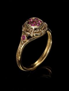 Unique victorian antique style 14K ring with 9 small canter ruby stones. Vintage ring. Top width : 1cm. *14K Solid Gold, we don't offer any plated or gold filled jewellery at all. Free Shipping for all orders . I offer a lifetime craftsmanship warranty on all of my jewellery. I resize all rings for life free of charge. Yellow Gold Ruby Ring With Intricate Design For Promise, Heirloom Gold Ruby Ring With Rose Cut Diamonds, Heirloom Ruby Ring With Rose Cut Diamonds In Gold, Antique 14k Stamped Ruby Wedding Ring, Victorian 14k Gold Ruby Ring With Intricate Design, Antique 14k Gold Ruby Ring With Intricate Design, Victorian Ruby Ring In Yellow Gold With Intricate Design, Antique Style Ruby Ring With Intricate Design For Wedding, Victorian Ruby Ring With Gold Center Stone