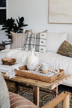 Styled Tengnanan Basket Tray on an antique Chinese coffee table. - Saffron and Poe Basket Tray Coffee Table, Coffee Table Woven Tray Decor, Coffee Table With Tray Decor, Tray On Dresser Decor, Coffee Table Basket Tray, Ottoman Tray Styling Living Room, Serving Tray On Ottoman, Styling A Tray On A Coffee Table, Decorative Tray Ideas Bedroom