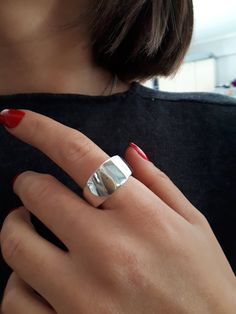 "Chunky Dome Ring, Sterling Silver, Statement Ring, Wide Band Ring, Unique Ring, Big Dome Ring, Modern Dome Ring, Ring for Womens Modern and Chic in Design, this Statement Dome Ring is stunning. Perfect on it's own and just may be the only ring you need. ✔~ 100% Handmade ~ ✔~ 100% 925 Sterling Silver ~ ✔~ Height 7.9 MM ~ \"the upper part\" ~ ✔~ Width 12.0 MM ~ \"the upper part\" ~ ✔~ Weight 13.0 grams \"in medium size\" ~ ✔~ Μade to order ~ ✔~ Free shipping ~ ✔~ Available Express shipping ~ ✔~ T Silver Minimalist Dome Ring With Wide Band, Modern Sterling Silver Dome Ring With Thick Band, Silver Minimalist Wide Band Dome Ring, Luxury Sterling Silver Statement Dome Ring, Modern Handmade Sterling Silver Dome Ring, Minimal Ring, Wide Band Ring, Dome Ring, Chunky Rings