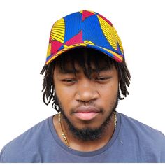 A unisex baseball cap made using authentic Ankara fabric. Adjustable. Snapback. Ankara, also known as African wax print or Dutch wax print, is a fabric characterized by vibrant patterns and colors. The fabric is made through a wax-resist dyeing technique called batik which creates the distinct and colorful patterns. Ankara fabric is used to make a wide range of clothing and accessories, including dresses, skirts, shirts, and hats. Each pattern carries cultural meanings and stories making pieces made from this fabric not just fashion items but also carriers of African heritage and identity. Casual Multicolor Fitted Hat With Curved Brim, Casual Multicolor Curved Brim Fitted Hat, Casual Multicolor Curved Brim Snapback Hat, Multicolor Casual Snapback Hat With Curved Brim, Casual Multicolor Snapback Hat With Curved Brim, Multicolor Curved Brim Snapback Hat, Casual Multicolor Fitted Cap, Multicolor Adjustable Baseball Cap With Curved Bill, Casual Multicolor Snapback Cap