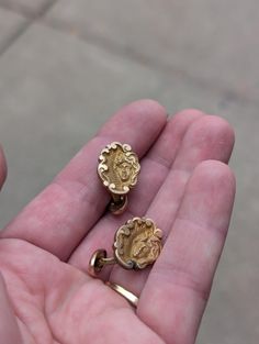 Art Nouveau Gold Face of a Woman Cufflinks. Unmarked and untested, but the posts appear to be rolled rose gold. Couldn't find another pair like this anywhere in searching. There some slight discoloration on the front and back of one of the cufflinks. Sold as is Antique Gold Cufflinks For Collectors, Antique Hallmarked Cufflinks For Wedding, Vintage Engraved Jewelry For Business, Antique Engraved Cufflinks For Wedding, Hallmarked Antique Cufflinks For Wedding, Antique Engraved Cufflinks For Anniversary, Cufflinks Women, Alfonse Mucha, Romantic Gifts For Him