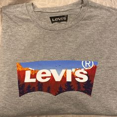 Never Worn Fall Logo Print Short Sleeve T-shirt, Fall Short Sleeve T-shirt With Logo Print, Gray Casual Shirt With Logo Print, Gray Logo Print Casual Shirt, Casual Gray Shirt With Logo Print, Levis T Shirt, Levis Shirt, Levi Strauss, Graphic Tee