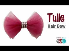 a pink bow that is on top of a white background with the words tulle hair bow