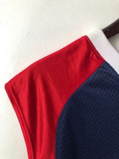 "late 90s converse wide shoulder v-neck jersey tank. deadstock. NWT. navy blue, red & white. white screen printed chest logo. in excellent, unworn condition. it's converse for comfort. 32\" long. 24\" across. legit. legitvintage.etsy.com legitvintage on instagram" Sporty V-neck Top For College, 90s Sports T-shirt For Summer, Summer V-neck Streetwear Tops, Sportswear Jersey Crew Neck Top, Jersey Crew Neck Tops For Sportswear, Sportswear Jersey Tops With Crew Neck, Red Tops For Sports Events In Summer, Red Tops For Summer Sports Events, Red Summer Tops For Sports Events