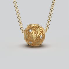 Introducing the epitome of elegance and Italian craftsmanship: the Gold Ball Pendant Necklace by Oltremare Gioielli. Meticulously handcrafted in Italy, this exquisite pendant embodies timeless beauty and sophistication. Crafted from the finest materials, this pendant is available in your choice of 14k or 18k gold, ensuring both luxury and durability. At its heart lies a celestial motif, adorned with a breathtaking star-shaped sashiko pattern, evoking a sense of celestial wonder and grace. Enhanc Traditional Yellow Gold Diamond-cut Necklace, Traditional Yellow Gold Diamond Cut Necklaces, Traditional Yellow Gold Diamond Cut Necklace, Ceremonial Yellow Gold Jewelry With Single Cut Diamonds, Ceremonial Diamond Cut Gold Jewelry, Ceremonial Yellow Gold Jewelry With Diamond Accents, Ceremonial Yellow Gold Diamond Cut Jewelry, Ceremonial Gold Diamond Necklace, Gold Ball Pendant