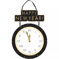 a clock with happy new year written on it's face and the words above it