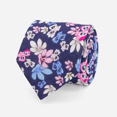 With its bold floral pattern and pops of pink and blue, this linen tie will make a stylish statement at your next destination wedding. | Men's Tie Bar: Tossed Lillies Tie - Skinny, In Navy, Linen, Floral Summer Floral Print Ties, Blue Summer Wedding Ties, Blue Floral Print Tie As Gift, Pink Floral Print Ties For Summer, Pink Floral Print Tie For Summer, Pink Floral Print Ties For Spring, Adjustable Blue Floral Print Tie, Pink Floral Print Summer Ties, Flower Tie