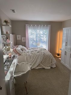 the bedroom is clean and ready to be used as a study area for someone's belongings