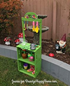 an outdoor toy garden with gnomes and potting plants