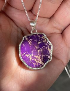 "Raw, natural, purple, sea sediment pendant necklace, set in 925 Sterling Silver bezel setting, with 18\" inches long chain. Pendant, including bail: 1.60\" x 1.15\" inches. Stone: 30mm x 28mm." Purple Jewelry With Natural Inclusions For A Gift, Purple Spiritual Necklace With Large Pendant, Spiritual Purple Necklace With Large Pendant, Purple Sterling Silver Pendant Necklace, Nickel-free Purple Sterling Silver Necklace, Nickel Free Purple Sterling Silver Necklace, Purple Necklace With Large Round Pendant, Purple Necklace With Large Stone For Gift, Purple Necklace With Large Pendant