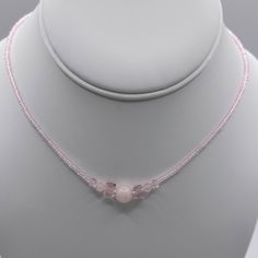 16 Inch Light Pink Glass Seed Beads. Light Pink Crystals With Rose Quartz Round Beads. Stretch Cord Used. Slip Over Your Head. Handmade Piece. Never Worn. Rose Quartz Choker, Beaded Rose Quartz Necklaces With Faceted Round Beads, Rose Quartz Beaded Necklaces With Faceted Beads, Beaded Rose Quartz Crystal Necklace, Handmade Pink Pearl Necklace, Beaded Rose Quartz Round Bead Jewelry, Light Pink Necklace, Light Pink Jewelry, Girly Necklace