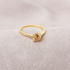 Citrine is a natural stone believed to bring abundance, abundance and money. It is believed to bring success. Citrine brings joy and happiness to the wearer. Increases motivation Our 14k solid gold and round cut citrine ring is suitable for daily use with its special design and will be your indispensable jewel that you can use on your special days. A stylish jewel for you and your loved ones. Time to pamper yourself and your loved ones... Citrine is the birthstone for those born in Nowember. 🤍? Gold Citrine Birthstone Ring With Prong Setting, Gold Crystal Ring With Topaz Birthstone, Gold Citrine Crystal Ring With Prong Setting, Yellow Gold Topaz Crystal Ring As Gift, Yellow Gold Topaz Birthstone Ring For Gift, Yellow Gold Topaz Birthstone Ring As Gift, Citrine Birthstone Ring With Prong Setting As Gift, Gold Topaz Birthstone Ring Gift, Classic Topaz Birthstone Ring For Gift