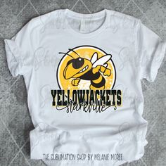 a white shirt with the words yellow jackets on it and a bee holding a tennis racquet