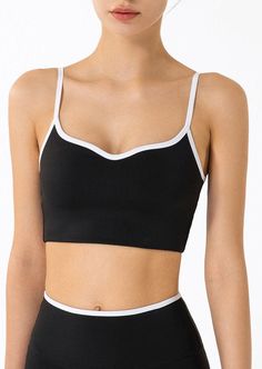 The Emes Shop sports bra is detailed with a white contrast hemline and straps. lined cups. an open low scoop back. and form fitted throughout. Pair it with our matching High Rise Contrast Biker Shorts for the cutest and easiest workout look.MATERIAL: 73% Nylon. 27% Spandex MEASUREMENTS: Small | Bust: 32.5" cm . Length: 30.5" cm Medium | Bust: 34.5" cm . Length: 32" cm Large | Bust: 36.5" cm . Length: 33.5" cm XL | Bust: 38.5" cm . Length: 35" cm MEASUREMENTS: Small | Bust: 12.8" in . Length: 12" in Medium | Bust: 13.6" in . Length: 12.6" in Large | Bust: 14.4" in . Length: 13.2" in XL | Bust: 15.2" in . Length: 13.8" in Sporty Fitted Bra With Straps, Fitted Sporty Bra, Sporty Fitted Bra, Sporty Sports Bra With Spaghetti Straps For Yoga, Sporty Spaghetti Strap Sports Bra For Yoga, Sporty Sports Bra With Spaghetti Straps And Stretch, Sporty Sports Bra With Spaghetti Straps For Gym, Sporty Sports Bra With Spaghetti Straps, Sports Bra With Straps In White