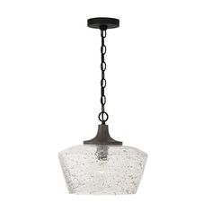 a glass light fixture hanging from a chain