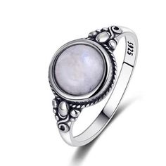 Treat yourself to luxury jewelry without the luxury price tag. Slender band shows off the many precision facets and brilliant sparkle of natural rainbow moonstone. Metal Stamp: 925,Sterling.Main Stone: Natural Moonstone, Gemstone.Weight: Approx 2.7 g | 0.1 oz.Stone Size: 8 MM | 0.31 inch.Available in size 6, 7, 8, 9 and 10.*NOTE: Due to the Chinese New Year Holiday, this item will ship by the end of February 2021. Guaranteed safe checkout:PAYPAL | VISA | MASTERCARD Please allow 9 - 24 business d Bohemian Style Rings, Sterling Silver Jewelry Rings, Rainbow Moonstone Ring, Bohemian Rings, Moonstone Jewelry, Round Rings, Boho Vintage, Ring Fit, Moonstone Ring