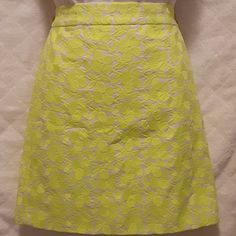 J Crew Mini Skirt. Electric Green Flowered Print Over Off White.Sz.00. Lined And Zips Up The Back. N.W.T. Measurements Are Approximate.. Waist "28 Length"15 1/2. .100%Cotten. Embroidery 100% Polyester Lining 100%Cotton. Dry Clean Only Smoke Free And Pet Friendly Home. Please Make Offers. Fitted A-line Skort For Spring, Green A-line Mini Skirt For Spring, Spring Fitted Full Skirt Skort, Fitted Full Skirt Skort For Spring, Cotton A-line Mini Skirt For Spring, Gold Mini Skirt, Denim Button Skirt, Sparkly Skirt, Color Block Skirt