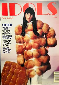 a magazine cover with a woman wearing a fur coat