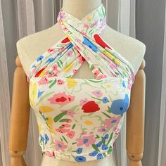 Very Cute. It’s Trendy Street Wear. Y2k Halter Floral Top Measurements: Size S: Bust 26”, Length 16.5”. Size M: Bust 27”, Length 17”. White Y2k Tops For Spring, Spring Y2k Halter Neck Top, Y2k Halter Neck Top For Spring, Y2k Style Halter Neck Tops For Spring, White Stretch Halter Top For Summer, White Fitted Halter Neck Top, White Fitted Halter Neck Crop Top, Fitted Halter Top For Spring, Y2k Style, Fitted Y2k Halter Top For Spring