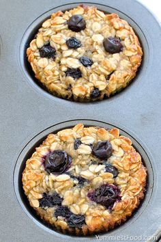 two blueberry oatmeal cookies in a muffin tin