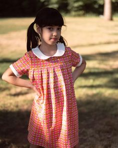 The retro pink plaid pleated peter pan collar dress is the perfect vintage-inspired piece for your little girl. Featuring a vibrant and playful plaid print and the sweetest peter pan collar, your little one will be irresistibly cute. Not only will they look absolutely cute in this timeless piece, they will be so comfortable since it's made from a stretchy cotton spandex blend material. Preppy Pink School Dress, Pink Retro Dress With Peter Pan Collar, Cute Pink Dress With Peter Pan Collar, Retro Pink Collared Dress, Pan Collar Dress, Peter Pan Collar Dress, Retro Vintage Dresses, Retro Kids, School Dresses