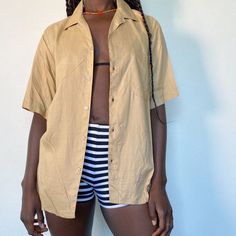 90s button up shirtThe trend for summerr! Wear it open, half done up with a mini skirt or tied up with some high waisted jeans.In a light weight material, beige is also a colour that you can match with everything! ..No marked size Modelled on a size 8...#buttonup #shirt #90s #y2k Women’s Button Up Shirt, Summer Button Up, Beige Collared Shirt For Summer, Beige Collared Summer Shirt, Beige Camp Shirt For Beach And Summer, Summer Vacation Beige Camp Shirt, Beige Camp Shirt For Spring Vacation, Beige Summer Shirt With Button Closure, Beige Button Closure Shirt For Summer