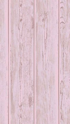 wood planks with pink paint on the top and bottom, as if it were painted in