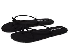 Volcom Fast Forward - Women's Shoes : Blackout : The Volcom Fast Forward Flat Sandals provide extra softness along with uniquely designed straps to offer a contemporary look. Knotted synthetic leather straps upper. Man-made lining and Memory foam insole. Slip-on style. Toe-post thong. Open round toe. Rubber sponge outsole. Imported. Measurements: Weight: 4 oz Product measurements were taken using size 9, width B - Medium. Please note that measurements may vary by size. Adjustable Flat Eva Sandals, Adjustable Eva Flip Flops For Spring, Adjustable Flip Flops With Removable Insole, Adjustable Flat Synthetic Flip Flops, Adjustable Strappy Synthetic Flip Flops, Adjustable Toe Post Synthetic Slippers, Strappy Synthetic Spring Flip Flops, Non-slip Synthetic Flat Slides, Navy Sporty Open Toe Slides