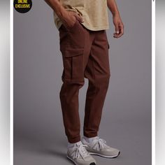 New With Tags. Size Medium. Rsq Twill Jogger Pants. Twill Jogger With 4-Way Stretch. Elastic Drawstring Waist. Side Slip Pockets. Small Right Side Zip Pocket. Back Right Welt Button Pocket. Elastic Cuffs. Casual Brown Pants With Hip Pockets, Casual Brown Pants With Side Pockets, Elevated Casual Straight Leg Joggers With Pockets, Straight Leg Joggers With Pockets For Elevated Casual, Casual Brown Cargo Pants For Streetwear, Casual Brown Cotton Cargo Jeans, Casual Brown Bottoms With Side Pockets, Brown Tapered Leg Cargo Pants With Elastic Waistband, Brown Straight Leg Sweatpants With Pockets