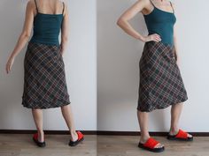 "Grey Plaid Skirt Tartan Skirt Wool Blend Skirt Checkered Skirt A-line Skirt Midi Skirt Zip Closure Large Size Fit size: Large Shown on model size S Measurements(lying flat): Length: 25 3/4''/ 65.5 cm Waist: 15 1/4\"/ 39 cm  Please check measurements to insure a proper fit. Remember to allow yourself some extra room for movement. You can compare these with something from your closet that fits you well. Condition: great Vintage Condition Material: 75% wool, 25% polyamide  Lining: 100% viscose SHIPPING: * I ship worldwide via Priority mail (Latvijas Pasts) from Latvia (EU). * Items are shipped 1 - 5 business days after receiving the payment. * I ship from Europe, so please allow 3 to 4 weeks for the package to arrive if you live overseas. * Europe 7 - 10 business days. 8" Casual Fitted Gathered Skirt, Casual Fitted Wrap Skirt, Casual Fall Wrap Skirt, Casual Long Wrap Skirt For Fall, Casual Fitted Flared Maxi Skirt, Fitted Midi Wrap Skirt For Fall, Fitted Fall Midi Wrap Skirt, Fitted Casual Wrap Skirt With Gathered Detail, Lined Mini Wrap Skirt For Fall