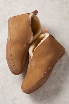 Overland's boot style slippers entirely crafted from double-faced Australian Merino sheepskin take your winter comfort seriously. Roll them down at the ankle to show the plush side or wear them up for higher coverage and warmth. Soft, dense, sheepskin surrounds your feet and provides premium insulation all season long, and a memory foam midsole provides extra cushioning and lasting durability. Shearling Slippers With Rubber Sole And Closed Toe, Winter Sheepskin Slippers With Rubber Sole, Comfortable Sheepskin Slippers With Leather Sole, Sheepskin Slip-on Slippers With Rubber Sole, Sheepskin Slippers With Leather Sole And Round Toe, Sheepskin Slip-on Slippers For Fall, Comfortable Shearling Slippers With Leather Sole, Cozy Leather Slippers With Suede Lining, Sheepskin Slippers With Rubber Sole And Round Toe