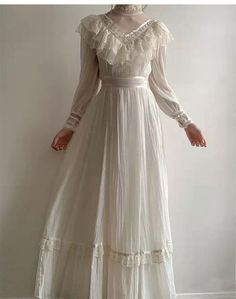 This vintage-inspired Gunne Sax wedding dress is ideal for every bride. Plus sizes are available, ensuring a perfect fit for every bride for the big day! Victorian Aesthetic Dress, Lace Victorian Dress, Gunne Sax Wedding Dress, Edwardian Wedding Dress, Victorian Lace Dress, Victorian Wedding Dress, White Prom, Modest Wedding Dress, Gunne Sax Dress