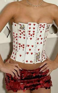 a woman wearing a corset with hearts on it