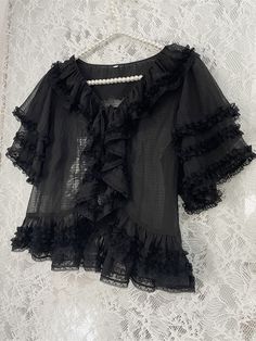 Dress / Top Details:Lace Trim / Ruffle Trim / Self-tie Straps / Semi-sheer Size S L Full Length 46 50 Bust 90 96 Sleeve Length 24 26 Elegant Sheer Short Sleeve Mesh Top, Summer Chiffon Tops With Lace Trim, Elegant Chiffon Top With Lace Trim, Black Ruffled Blouse For Daywear, Semi Sheer Top, Lace Ruffle, Dress Top, Sheer Top, Lolita Fashion