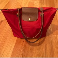 Tiny White Stain On The Left Side Of The Front Handle/Haven't Tried Removing It Good Condition Regular Wear And Tear Last Photo: 4 Corners Longchamp Red, Longchamp Bags, Red Tote, White Stain, Longchamp Le Pliage, Womens Tote Bags, Red And White, Tote Bag, Red