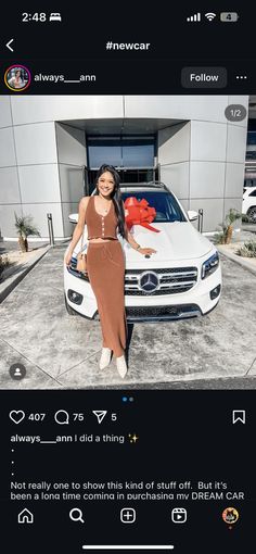 a woman standing in front of a white car