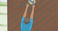 a man reaching up to hit a ball with his hands while standing in front of a brick wall