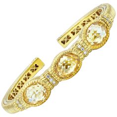 18K yellow gold bangle bracelet features 24.00 ct oval citrines and 0.60 cts of round diamonds Yellow Gold Bangle, Judith Ripka, Gold Bangle Bracelet, Gold Bangle, Gold Bangles, Bangle Bracelet, In The Middle, Arm Band, The Middle