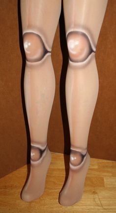 a mannequin's legs and butts are visible in this image