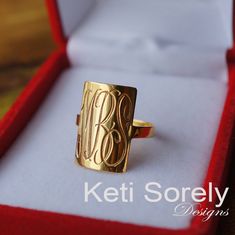 "Engrave your initials to create one of the kind monogram ring which last for lifetime. Ring will be hand crafted by our talented jewelers. Geometrical shape ring with your monogram initials. Design by: Keti Sorely Specifications: Ring face - 0.8\" (20mm X 15mm) Ring size: 5 to 11 (please advise if you need smaller size) Order 1-3 letters only. Metal options: * Sterling Silver * Sterling Silver with yellow gold overlay * Sterling Silver with rose gold overlay *14K Yellow gold filled * 14K Rose G Rectangular Monogram Jewelry For Anniversary, Classic Monogram Rectangular Jewelry, Anniversary Initial Ring With Rectangular Shape, Rectangular Initials Ring As Gift, Rectangular Initials Ring Perfect For Gift, Rectangular Initials Rings For Anniversary, Rectangular Initials Ring For Gift, Personalized Rectangular Signet Ring Gift, Personalized Rectangular Signet Ring For Gift