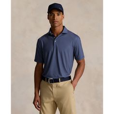 This Polo shirt’s diamond-print stretch jersey is developed with moisture-wicking properties to help keep you cool and comfortable on the course. Flexible Polo Collar Tops For Golf, Classic Sports Tops With 4-way Stretch, Classic Sports Top With 4-way Stretch, Go-dry 4-way Stretch Top For Golf, Golf Tops With Go-dry 4-way Stretch, Classic Moisture-wicking Tops For Golf, Moisture-wicking 4-way Stretch Golf Top, 4-way Stretch Polo Collar Tops For Golf, Blue Sporty Polo Shirt With 4-way Stretch