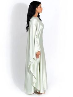 Embrace elegance in our new satin cloak, featuring long sleeves and a loose fit for comfort and style. With an O-neck design, this long dress exudes sophistication, perfect for ladies who seek a fashionable yet relaxed ensemble for any occasion. Details: Fit Type: Slim Neckline: O-Neck Material: Silk Material: SPANDEX Closure Type: Pullover Waistline: Natural Silk Material, Cloak, Neck Designs, Long Dress, Loose Fitting, Long Sleeves, Satin, Silk, Wardrobe