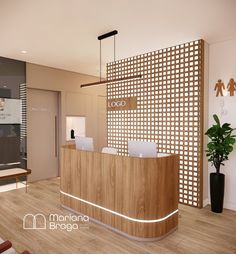 a reception area with wooden flooring and white walls