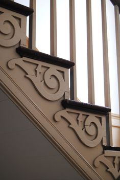 an ornate stair case on the side of a building