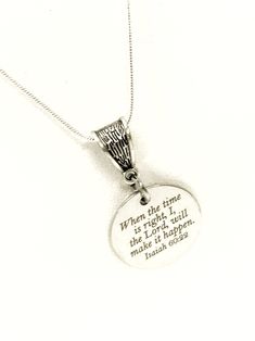 a necklace with a quote on it that says when the time is right, the lord will